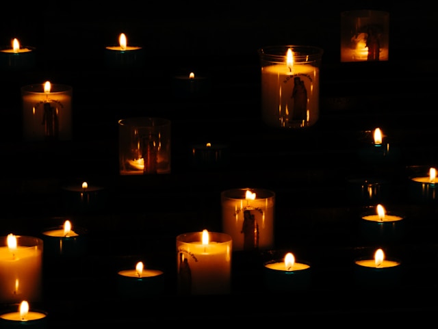 candlelit memorial arrangement"